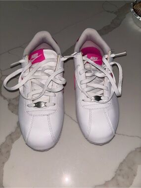 Nike White Sneakers with Pink Tongue Accents